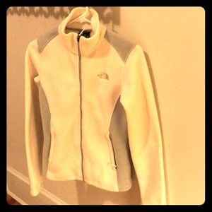 White and gray North Face zip up fleece